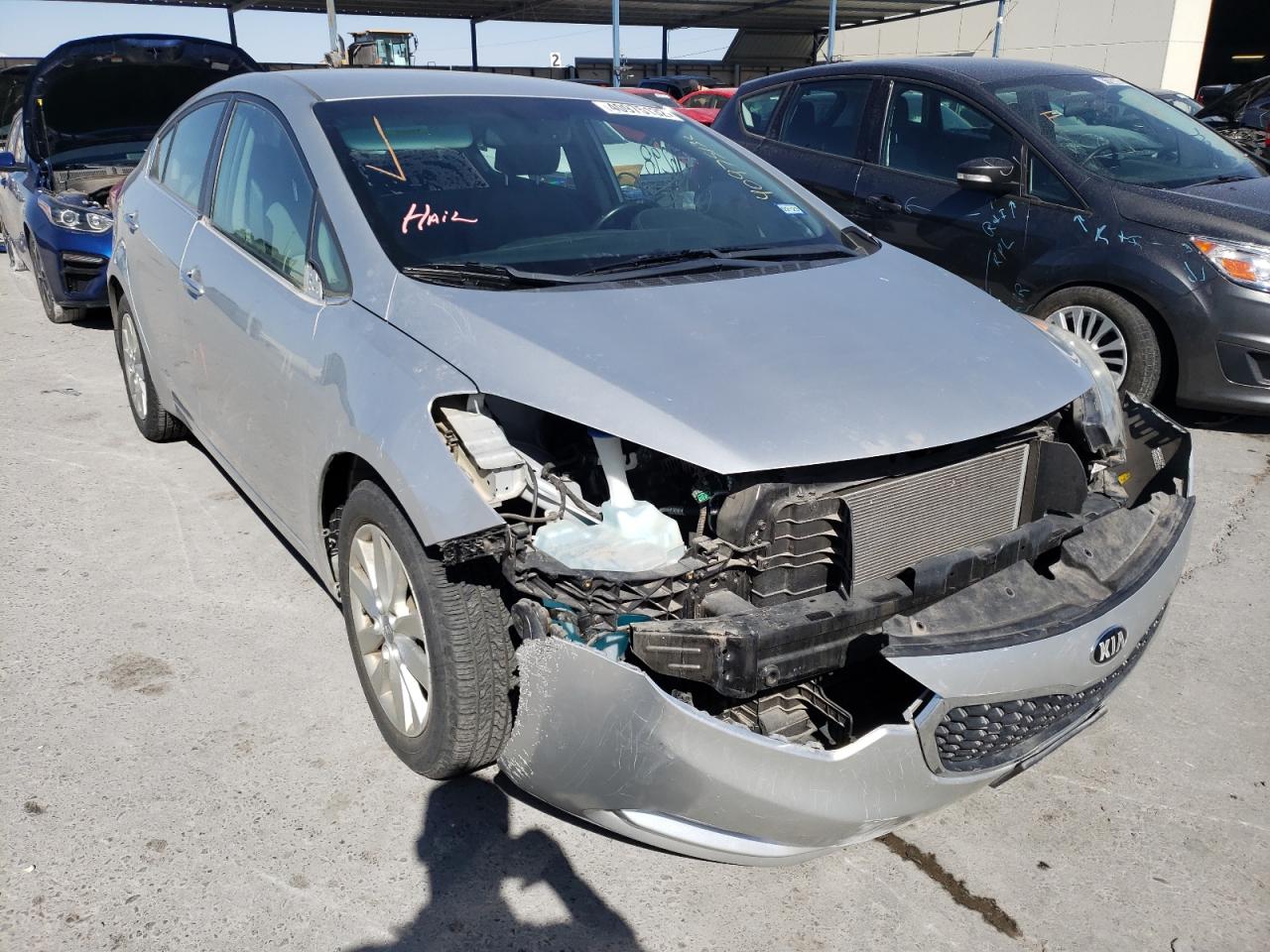 KIA FORTE EX 2014 with VIN KNAFX4A80E5199558 - Photo from auction
