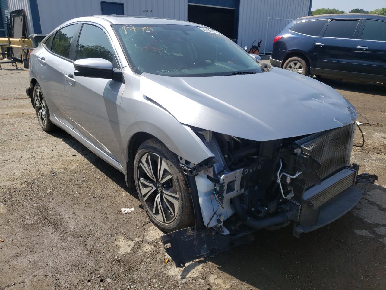 HONDA CIVIC EXL 2018 with VIN JHMFC1F77JX040241 - Photo from auction
