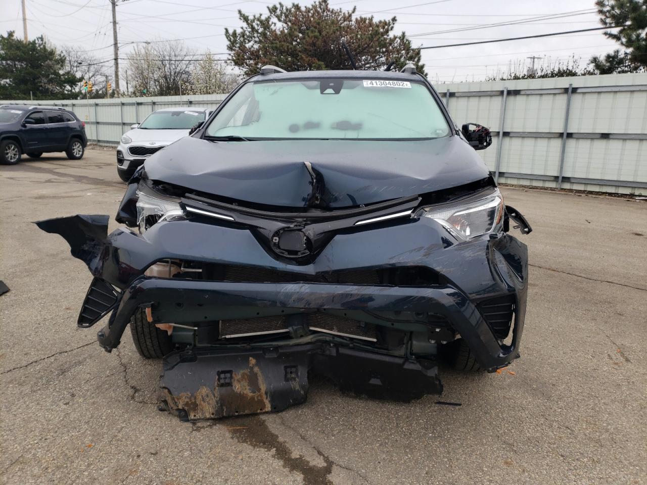 Photo 9 from auction – 2018 TOYOTA RAV4 LE with VIN JTMBFREV1JJ249631