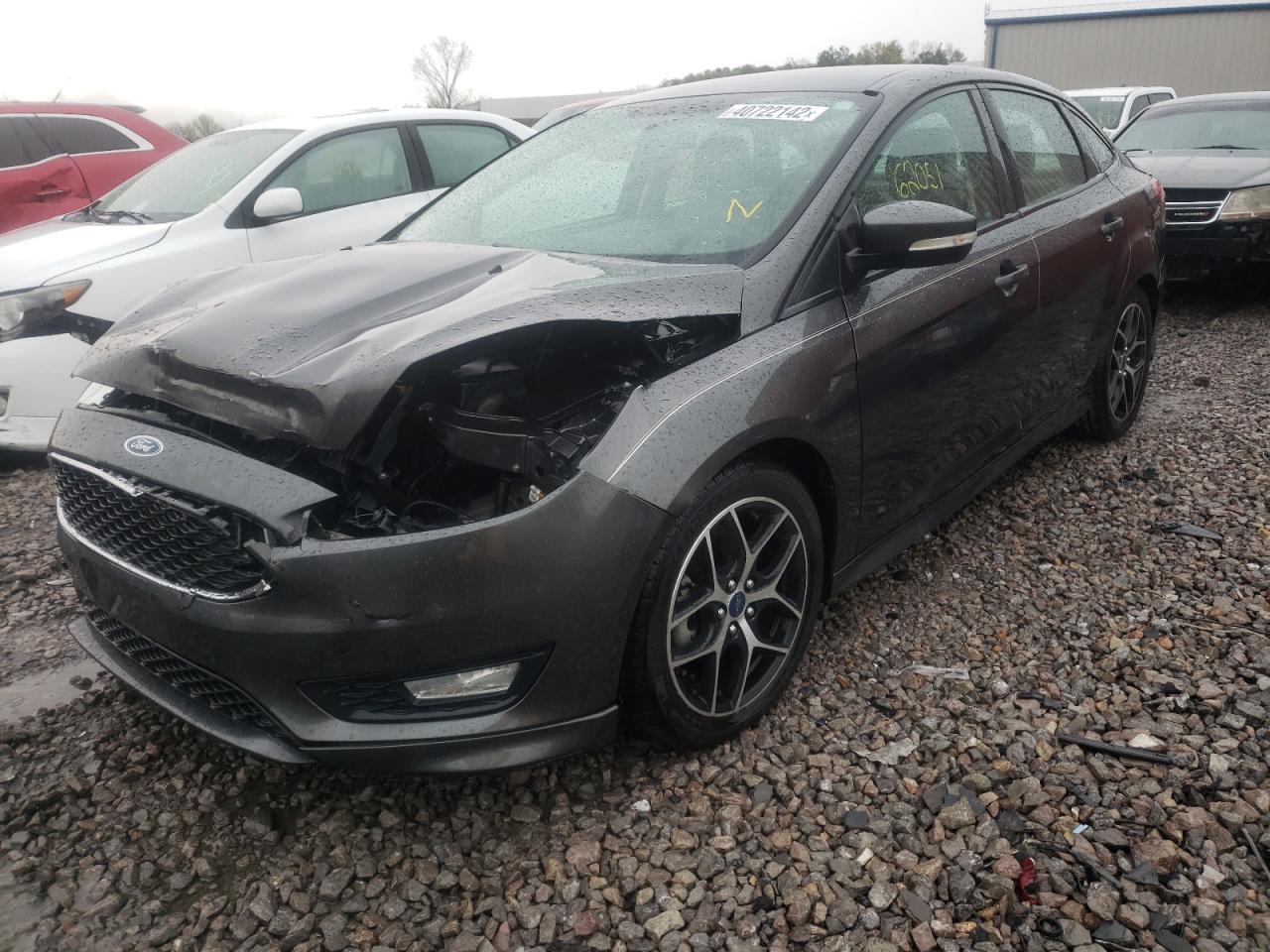 Photo 2 from auction – 2015 FORD FOCUS SE with VIN 1FADP3F2XFL304165