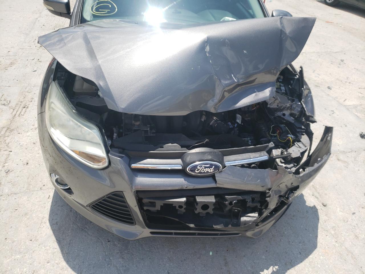 Photo 7 from auction – 2014 FORD FOCUS SE with VIN 1FADP3F24EL339279