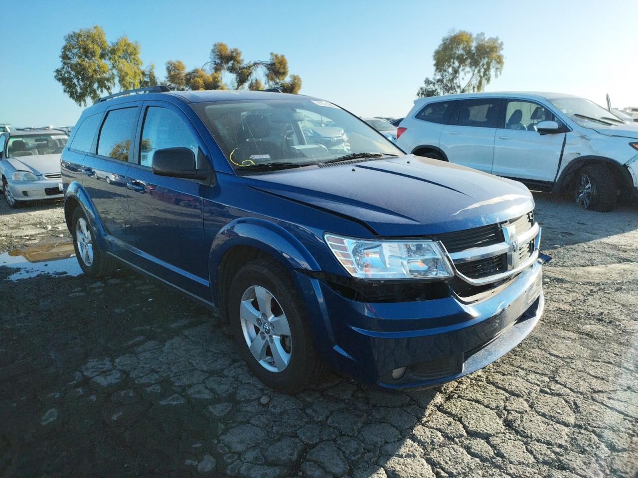 DODGE JOURNEY SX 2010 with VIN 3D4PG5FV8AT269395 - Photo from auction