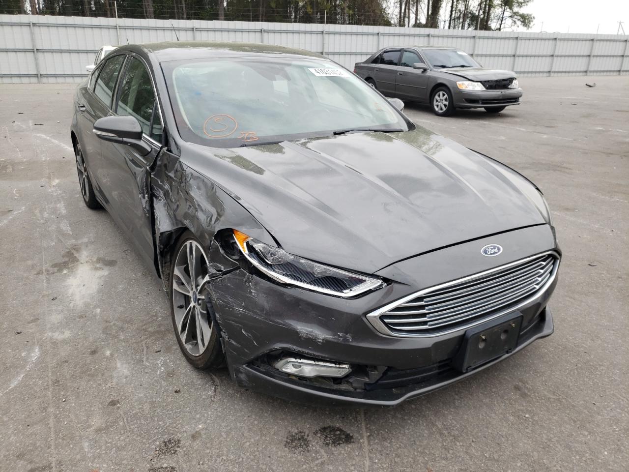 FORD FUSION TIT 2017 with VIN 3FA6P0K94HR174091 - Photo from auction