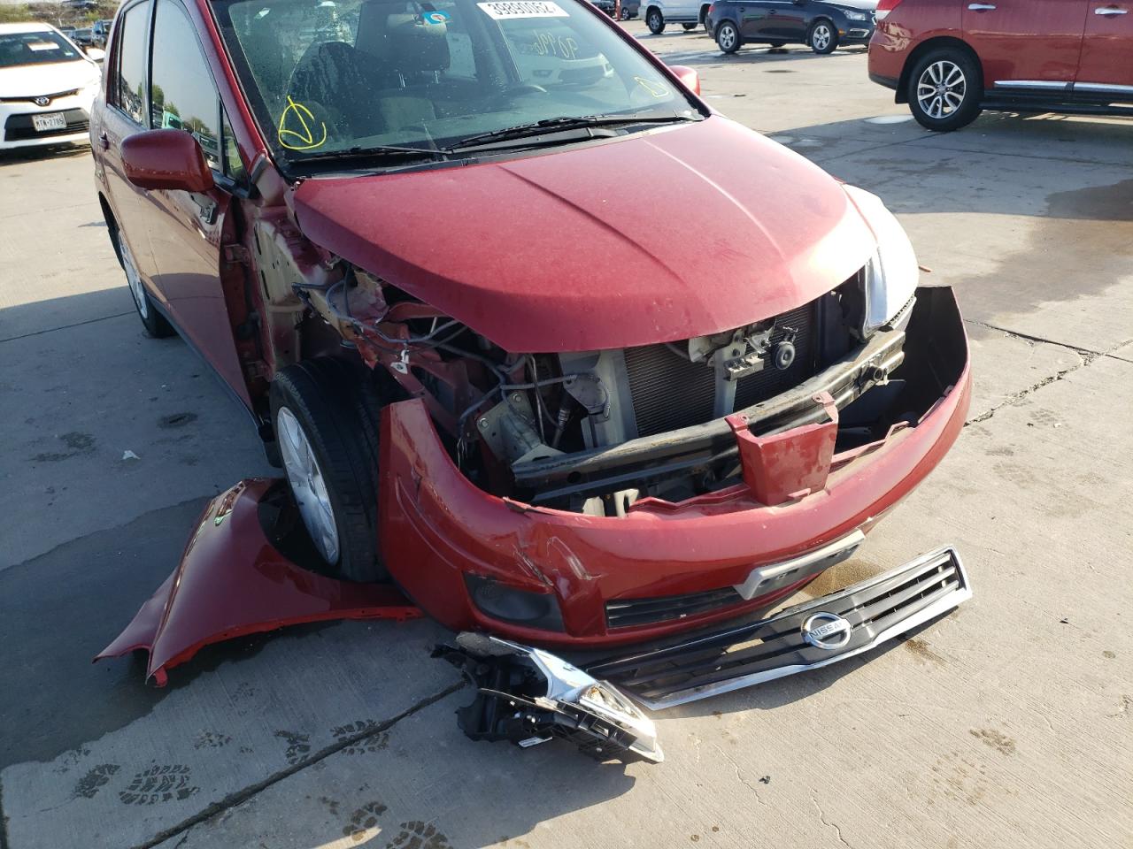 Photo 9 from auction – 2011 NISSAN VERSA S with VIN 3N1BC1AP4BL364030