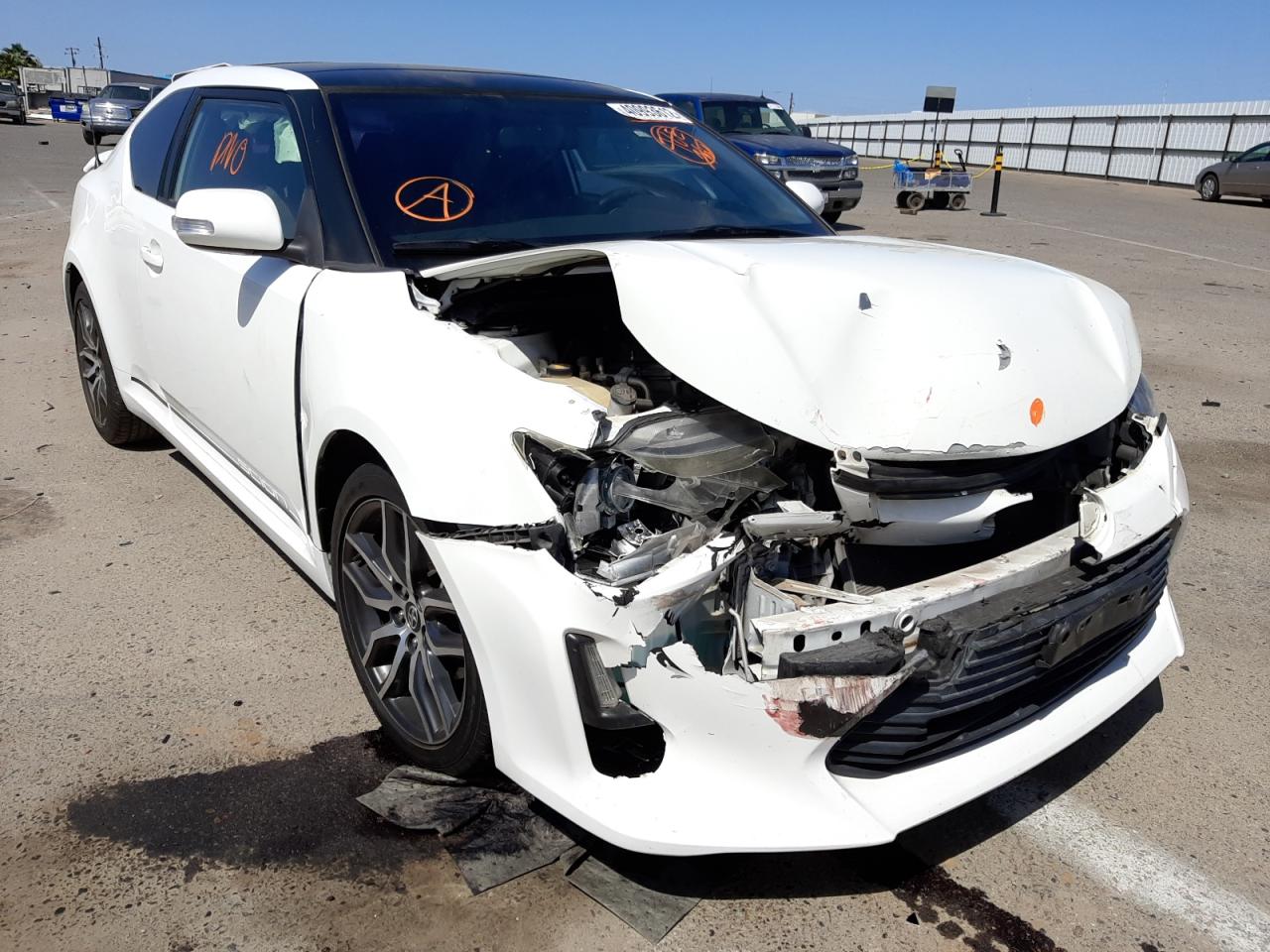 TOYOTA SCION TC 2014 with VIN JTKJF5C7XE3067390 - Photo from auction