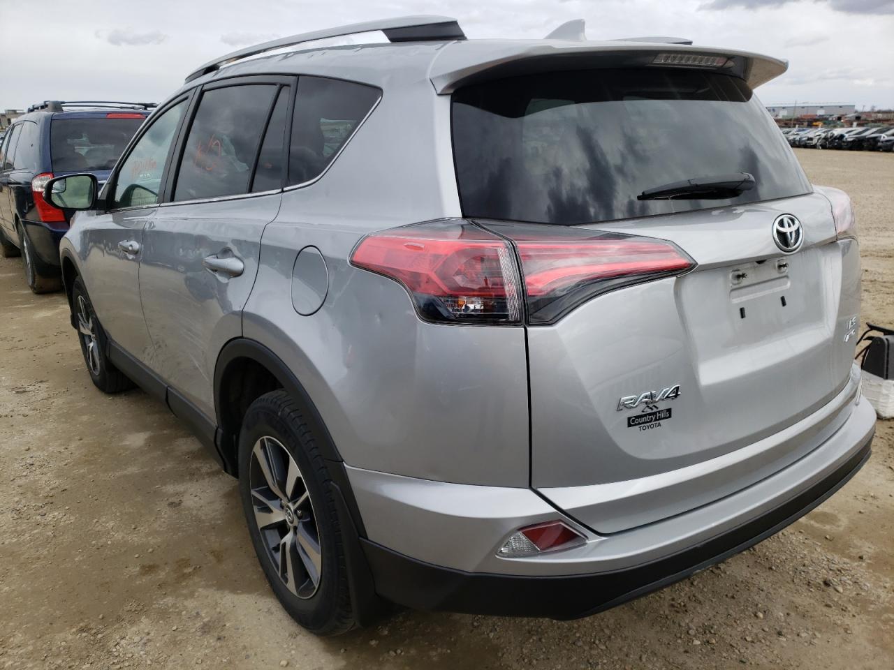 Photo 3 from auction – 2018 TOYOTA RAV4 LE with VIN 2T3BFREV9JW765981