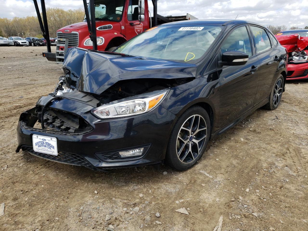 Photo 2 from auction – 2016 FORD FOCUS SE with VIN 1FADP3F22GL383543