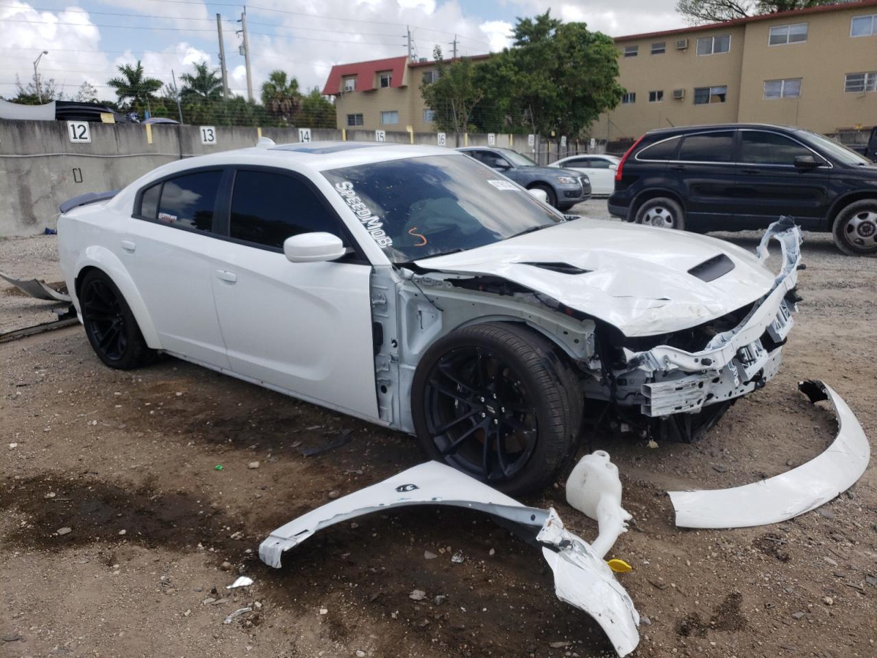 DODGE CHARGER SC 2021 with VIN 2C3CDXGJ0MH584611 - Photo from auction