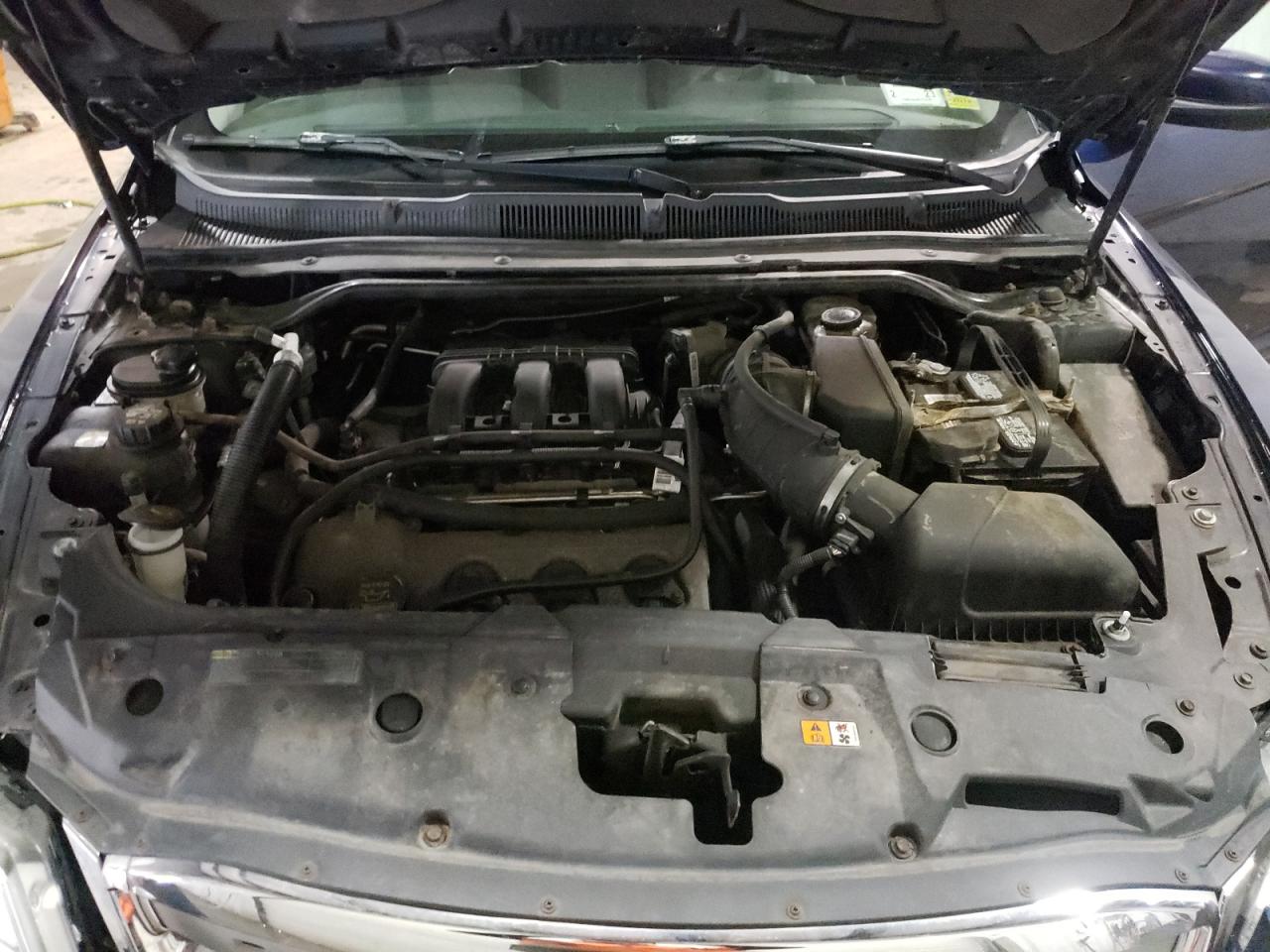 Photo 7 from auction – 2011 FORD TAURUS SEL with VIN 1FAHP2EW7BG120997