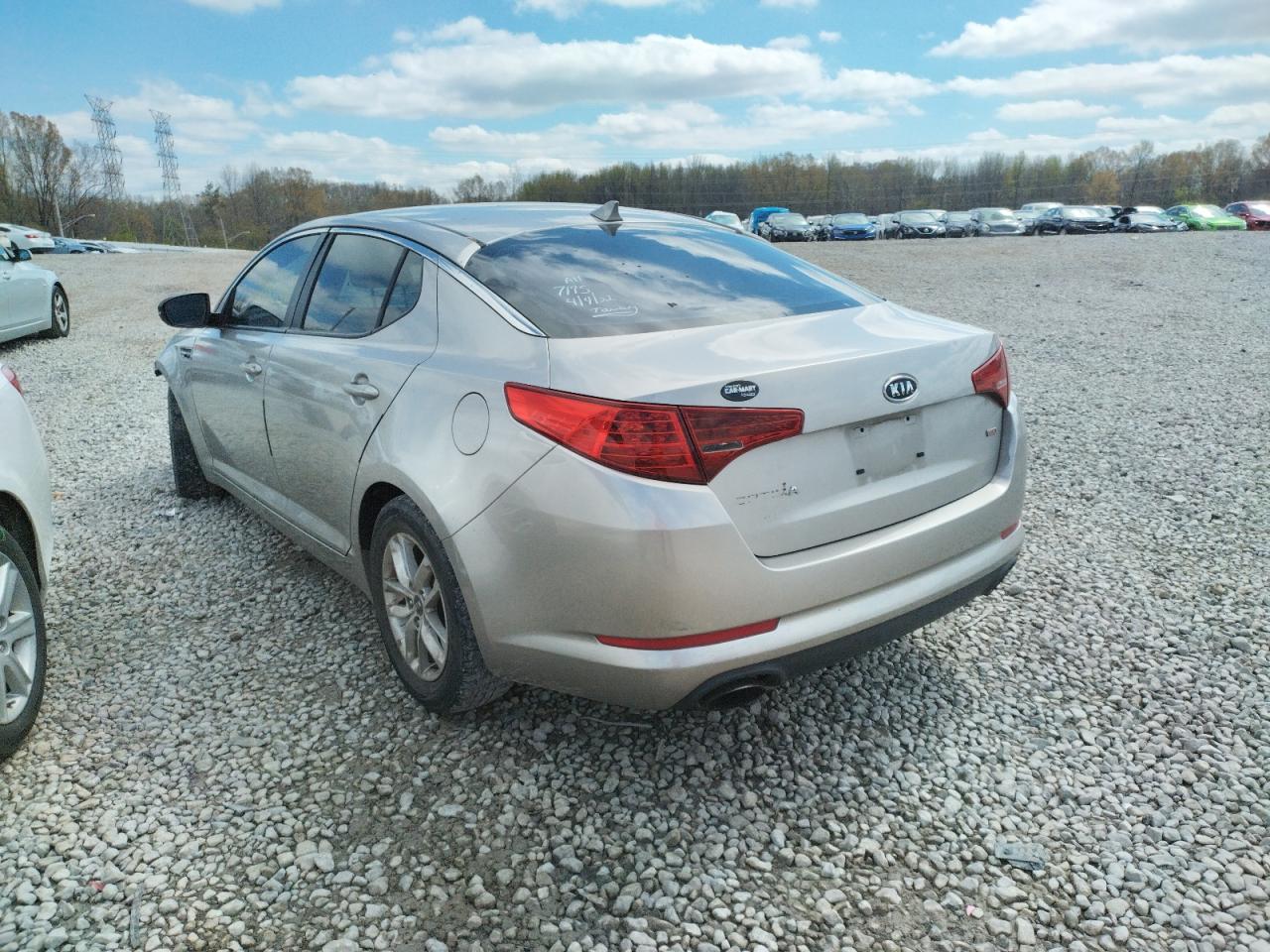Photo 3 from auction – 2011 KIA OPTIMA LX with VIN KNAGM4A79B5071352