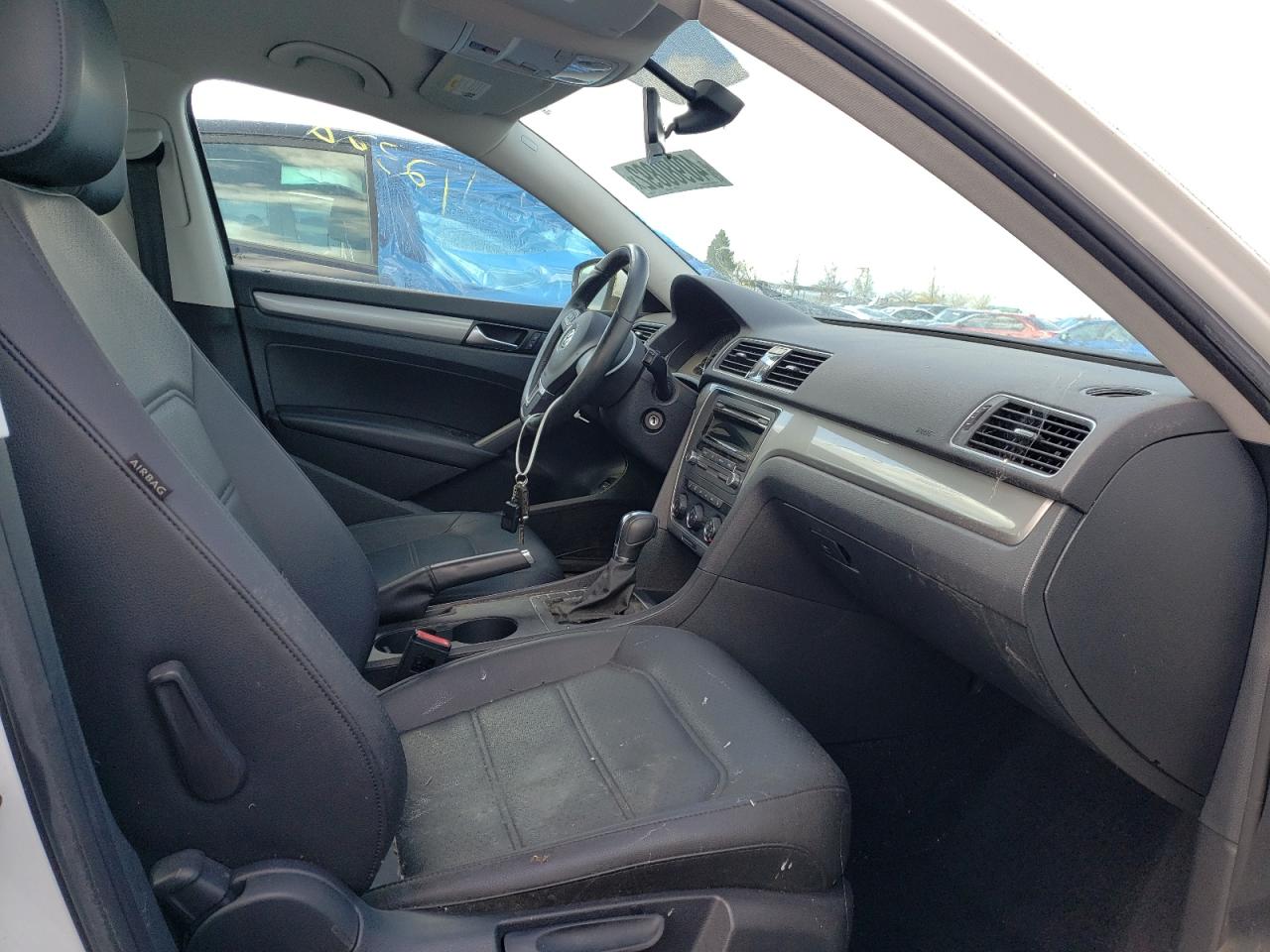 Photo 5 from auction – 2014 VOLKSWAGEN PASSAT S with VIN 1VWAT7A38EC050466