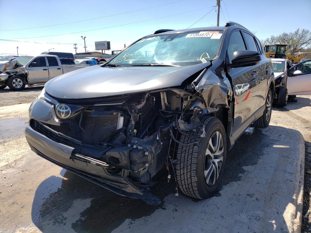 Photo 2 from auction – 2017 TOYOTA RAV4 LE with VIN JTMZFREV2HJ712580