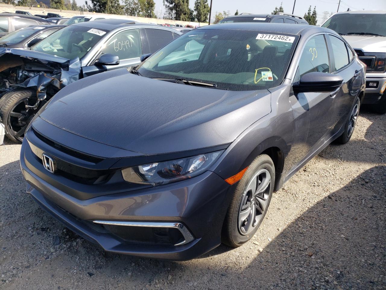 Photo 2 from auction – 2021 HONDA CIVIC LX with VIN 2HGFC2F60MH551301