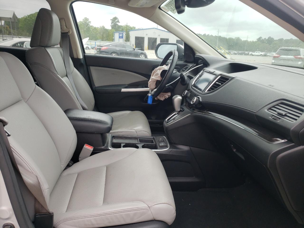 Photo 5 from auction – 2015 HONDA CR-V TOURI with VIN 5J6RM3H95FL020648