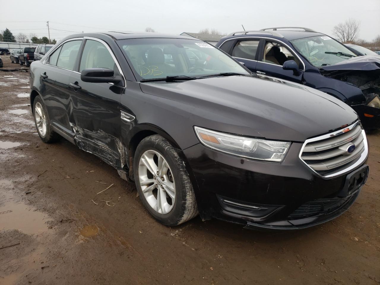 FORD TAURUS SEL 2014 with VIN 1FAHP2E92EG152500 - Photo from auction