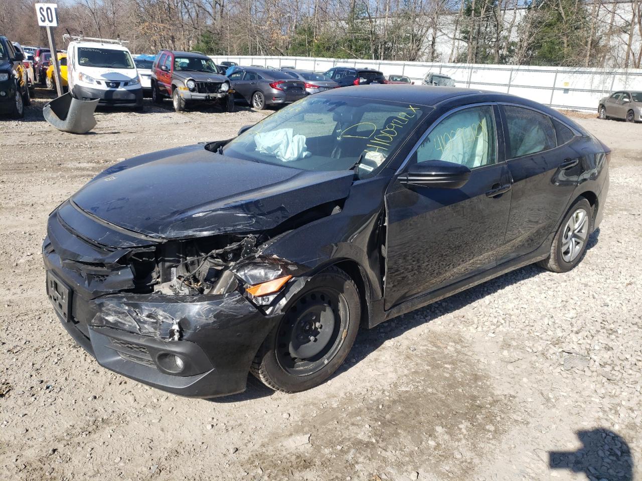 Photo 2 from auction – 2017 HONDA CIVIC LX with VIN 19XFC2F57HE230945