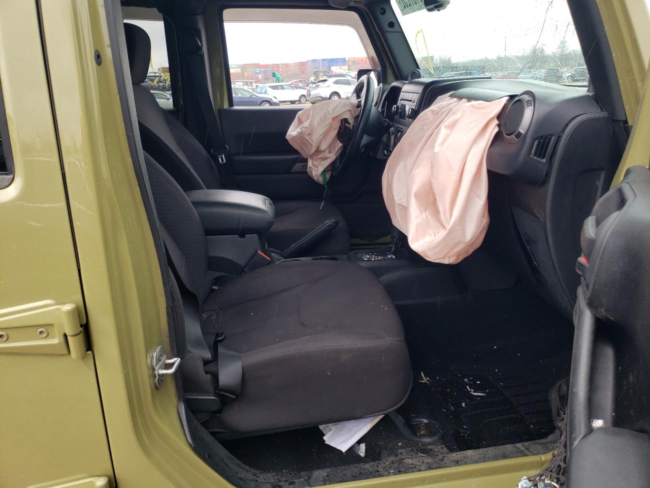 Photo 5 from auction – 2013 JEEP WRANGLER U with VIN 1C4BJWDG9DL539267