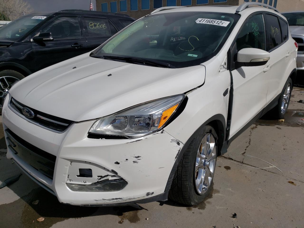 Photo 2 from auction – 2014 FORD ESCAPE TIT with VIN 1FMCU9J97EUD95888