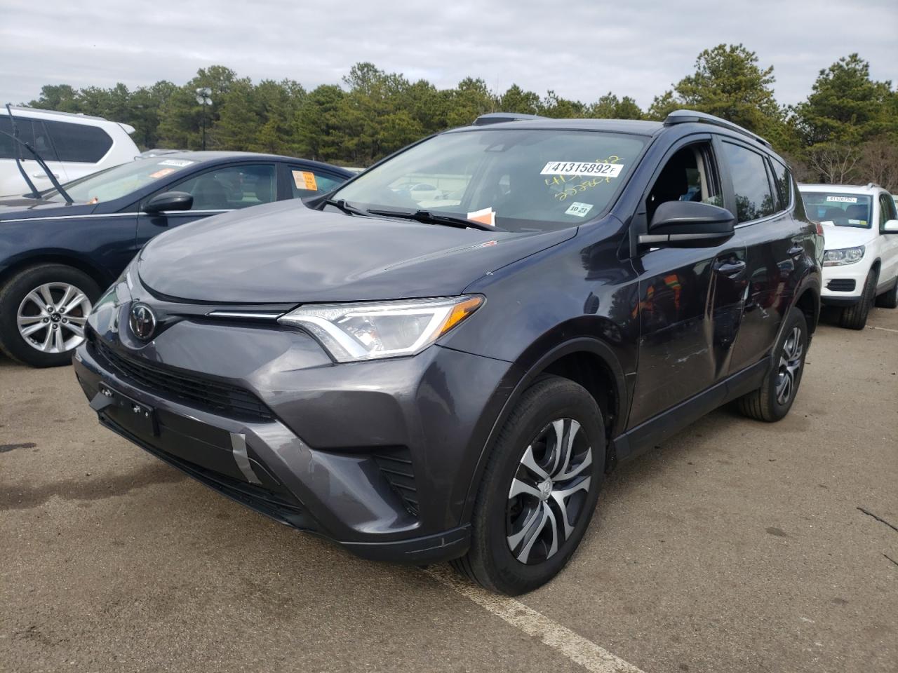 Photo 2 from auction – 2018 TOYOTA RAV4 LE with VIN JTMBFREV9JJ222807