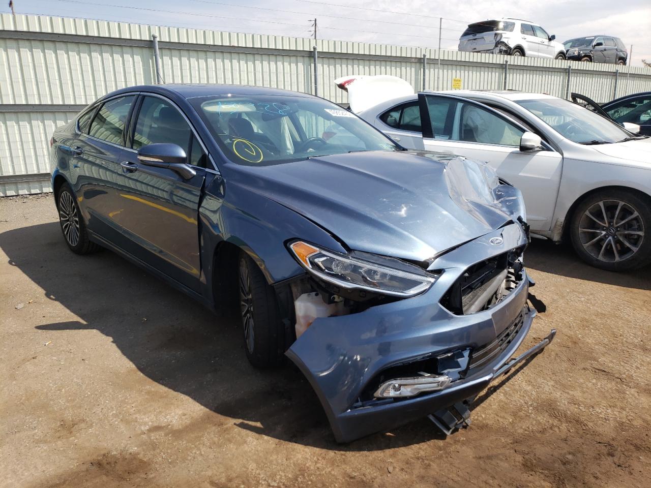 FORD FUSION TIT 2018 with VIN 3FA6P0RUXJR219969 - Photo from auction
