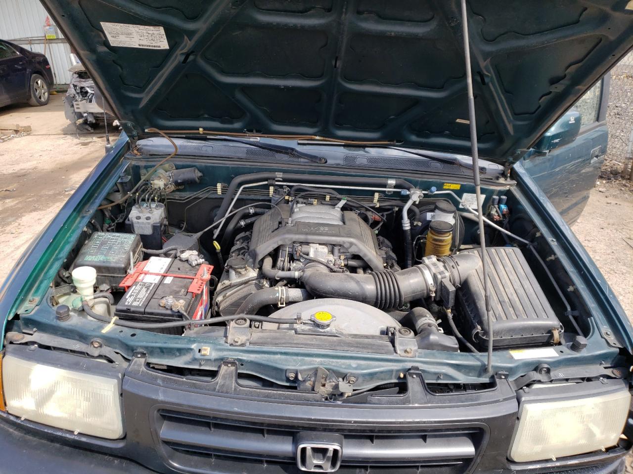 Photo 7 from auction – 1998 HONDA PASSPORT E with VIN 4S6CM58WXW4421686