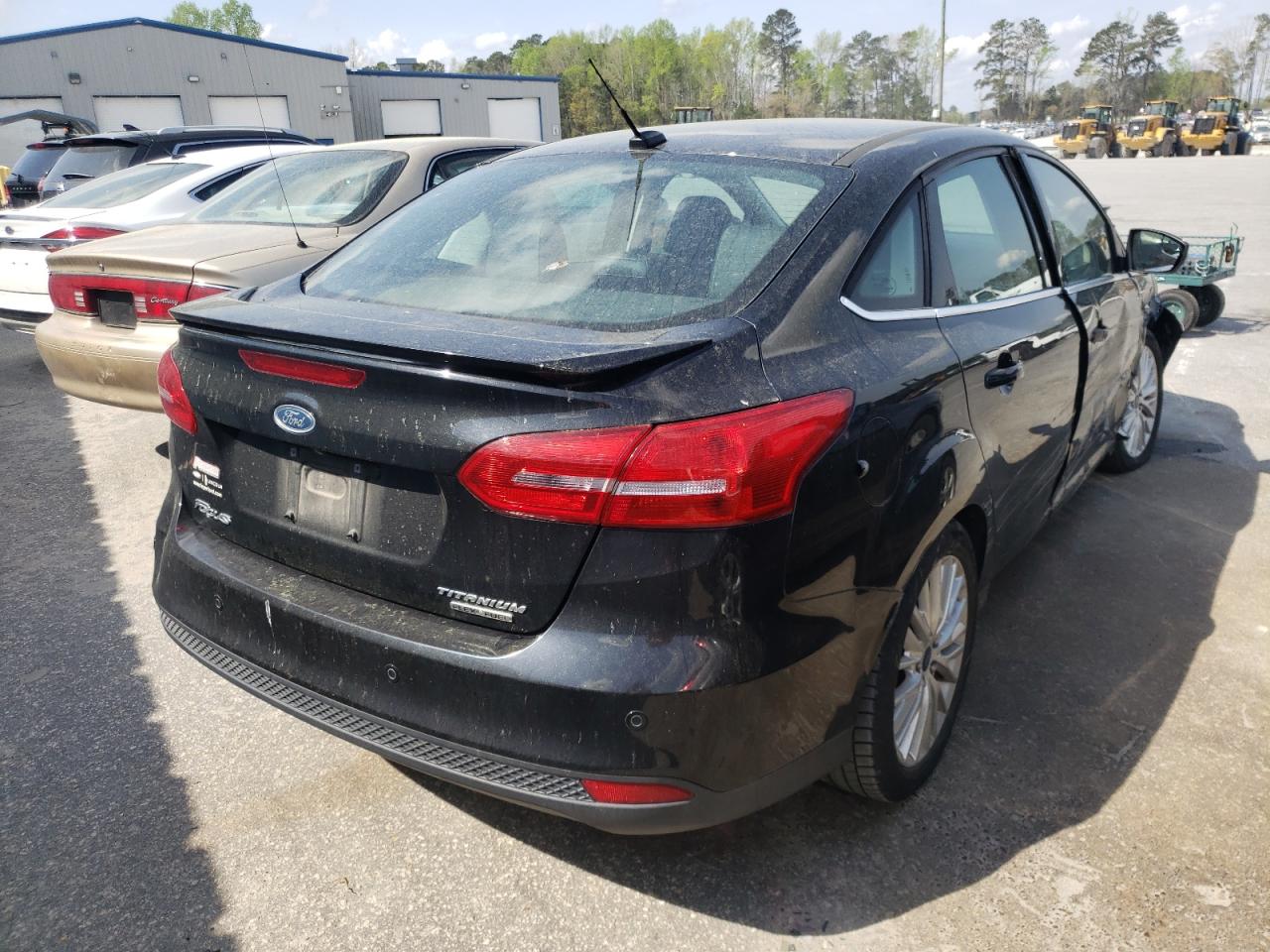 Photo 4 from auction – 2015 FORD FOCUS TITA with VIN 1FADP3J22FL228626