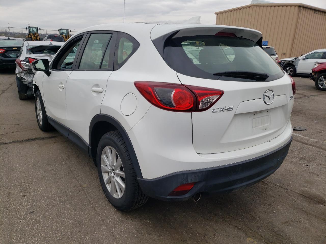 Photo 3 from auction – 2014 MAZDA CX-5 SPORT with VIN JM3KE2BEXE0342746