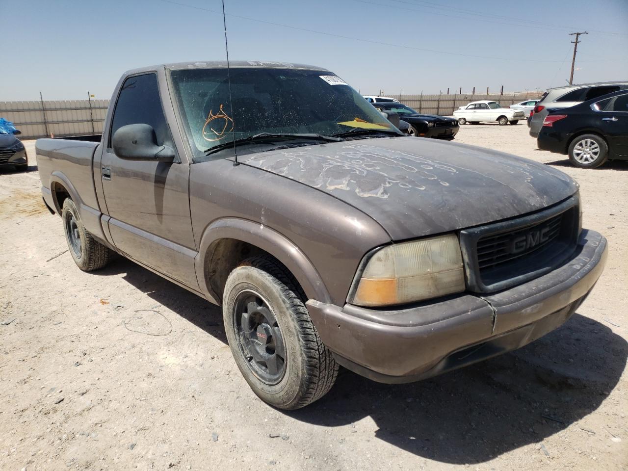 GMC SONOMA 1999 with VIN 1GTCS1446X8524677 - Photo from auction