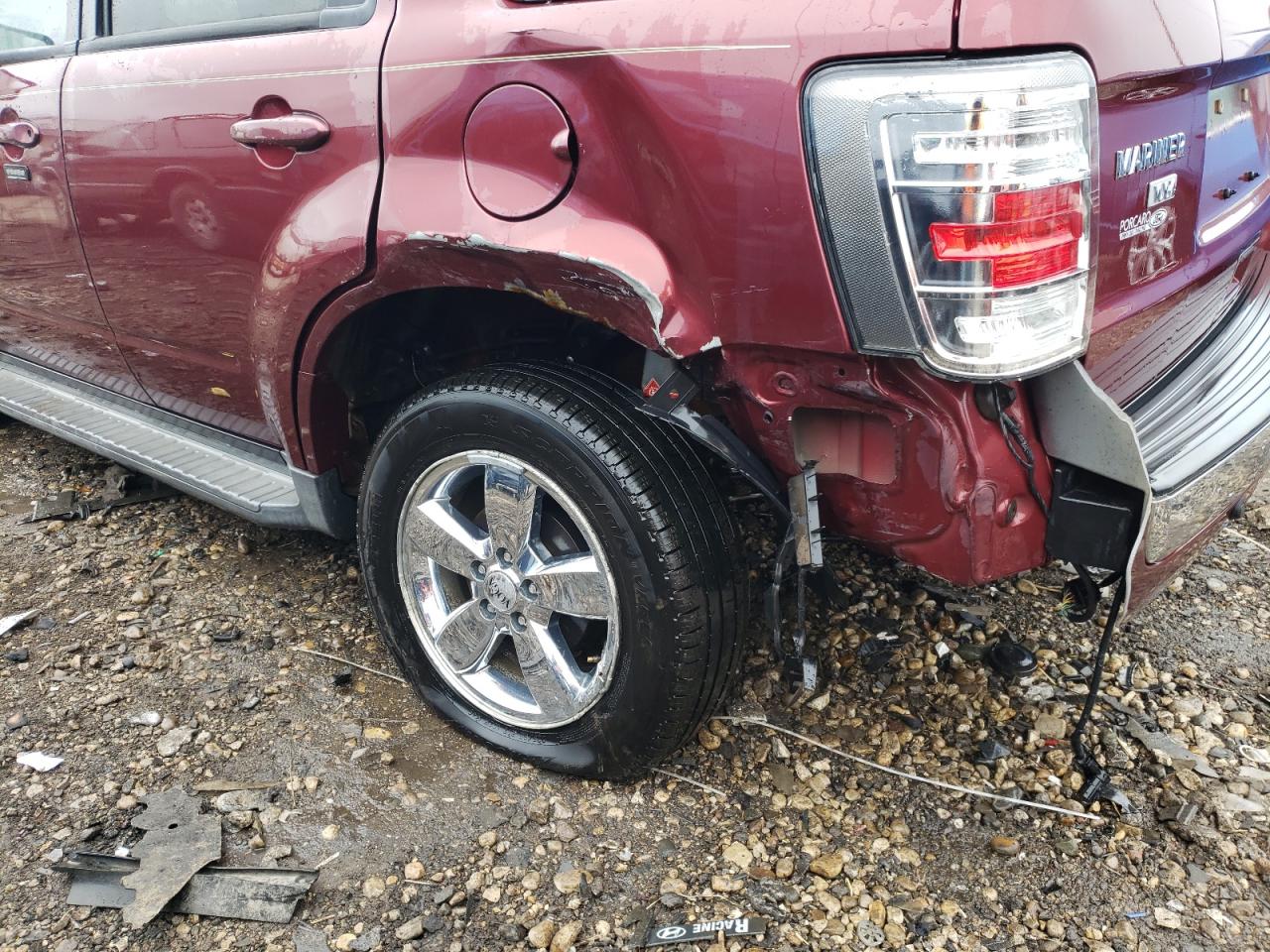 Photo 9 from auction – 2010 MERCURY MARINER PR with VIN 4M2CN8HG2AKJ13396