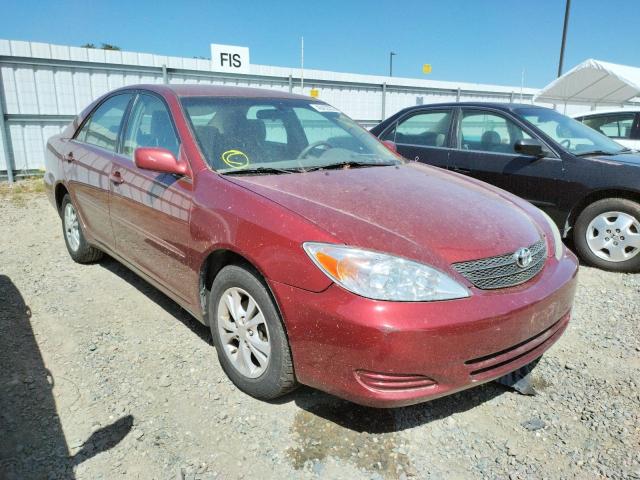 TOYOTA CAMRY LE 2004 with VIN 4T1BF32K04U065898 - Photo from auction
