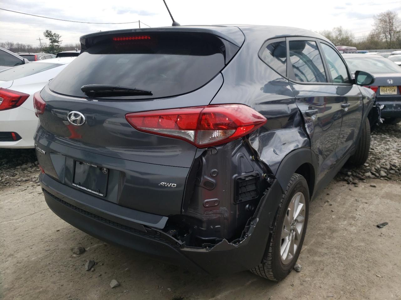 Photo 4 from auction – 2018 HYUNDAI TUCSON SE with VIN KM8J2CA46JU634985