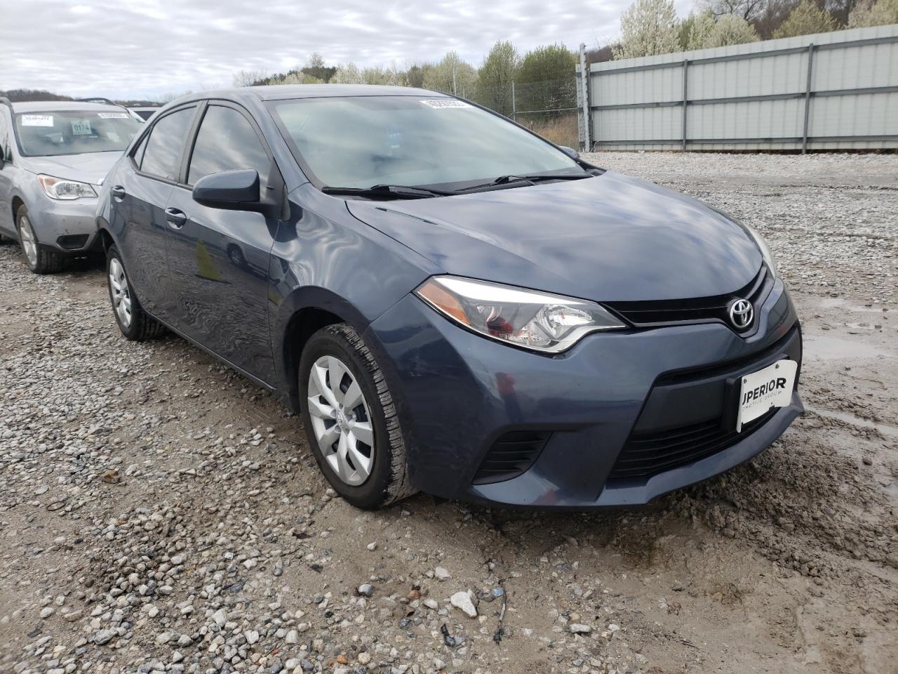 TOYOTA COROLLA L 2014 with VIN 5YFBURHE8EP171139 - Photo from auction