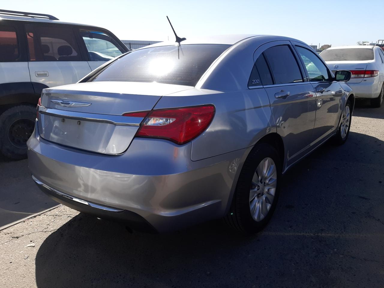 Photo 4 from auction – 2014 CHRYSLER 200 LX with VIN 1C3CCBAB1EN206717