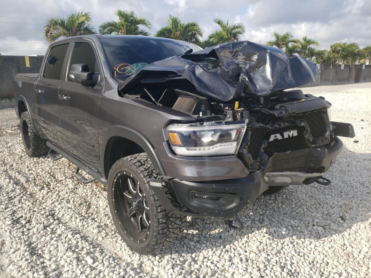 RAM 1500 REBEL 2019 with VIN 1C6RRELT0KN526786 - Photo from auction