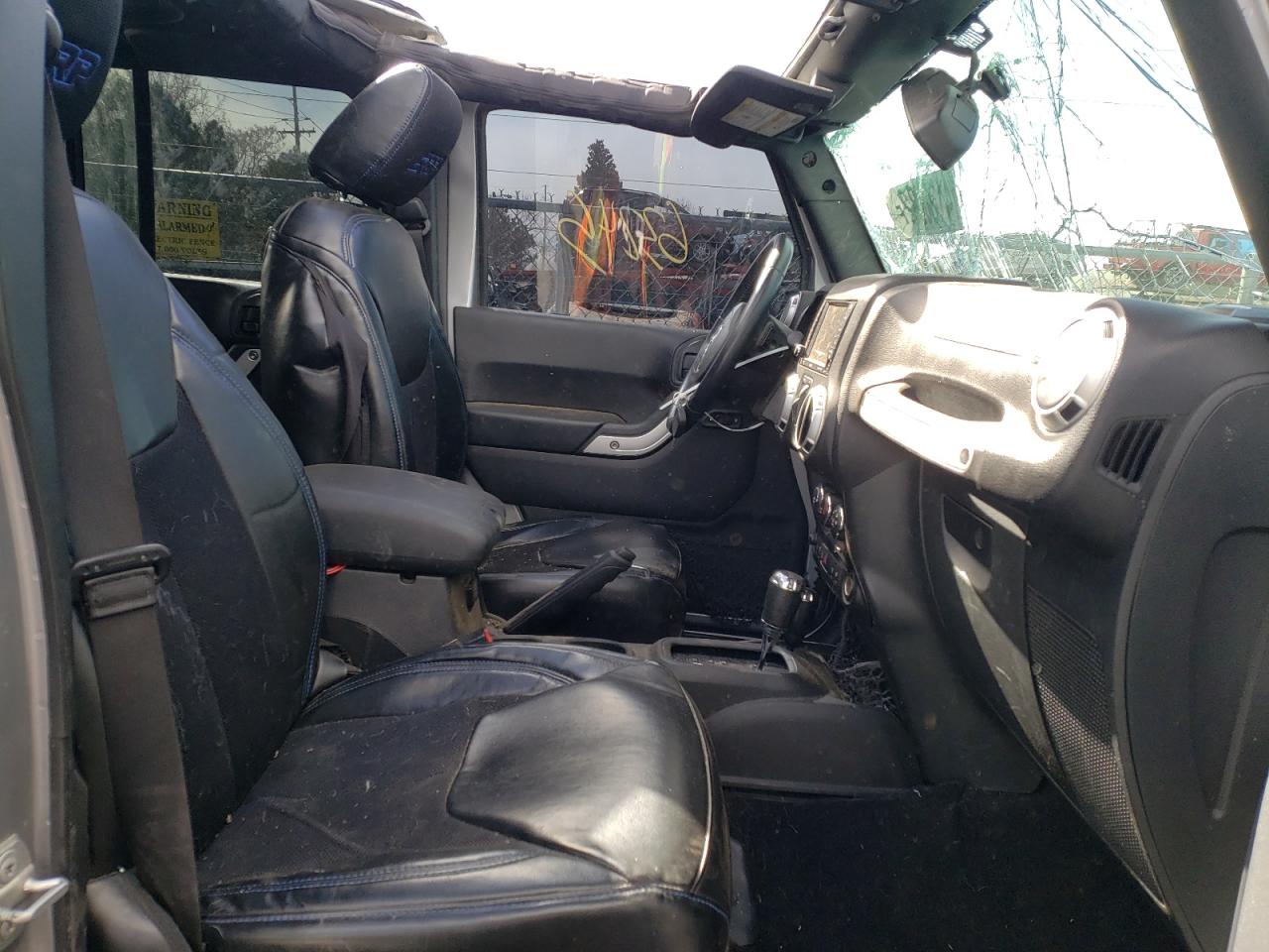 Photo 5 from auction – 2016 JEEP WRANGLER U with VIN 1C4BJWFG9GL119266