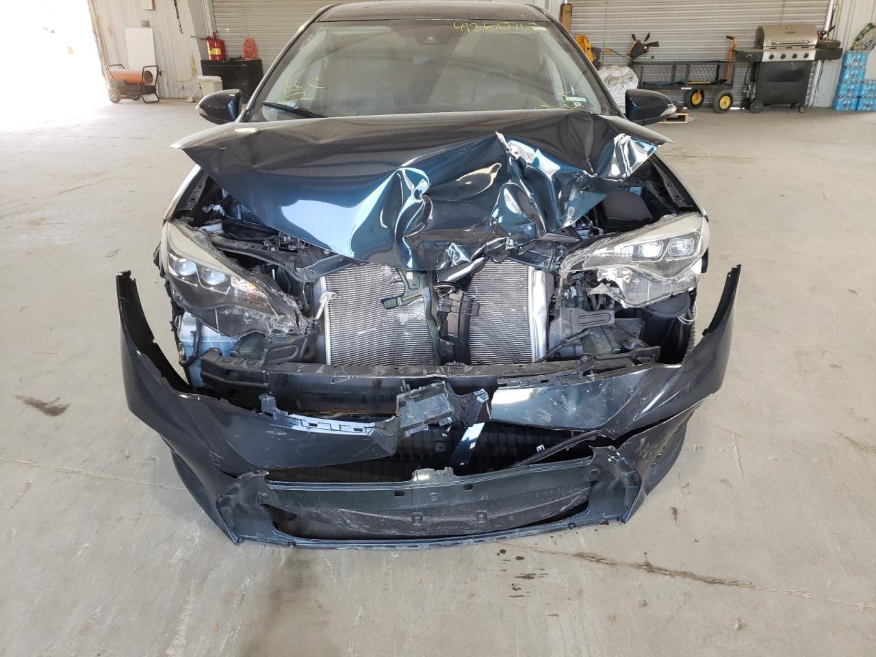 Photo 9 from auction – 2018 TOYOTA COROLLA L with VIN 5YFBURHE2JP779670