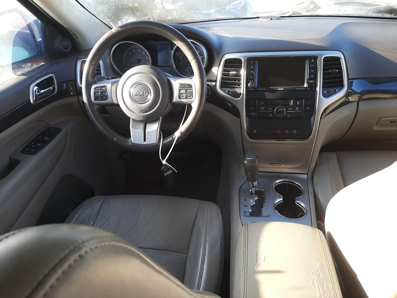 Photo 9 from auction – 2011 JEEP GRAND CHER with VIN 1J4RR4GG3BC525900