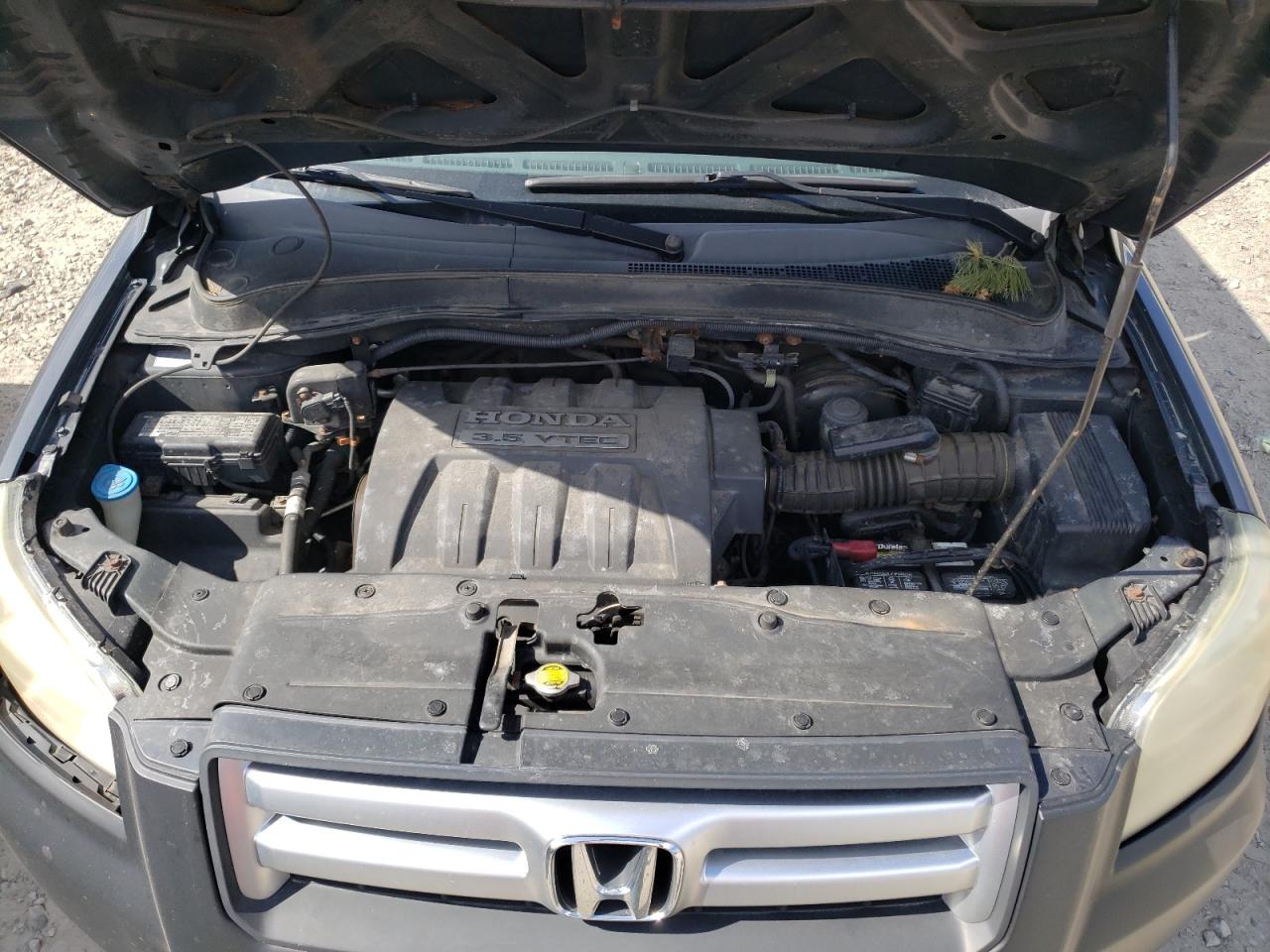 Photo 7 from auction – 2006 HONDA PILOT EX with VIN 2HKYF18606H551766