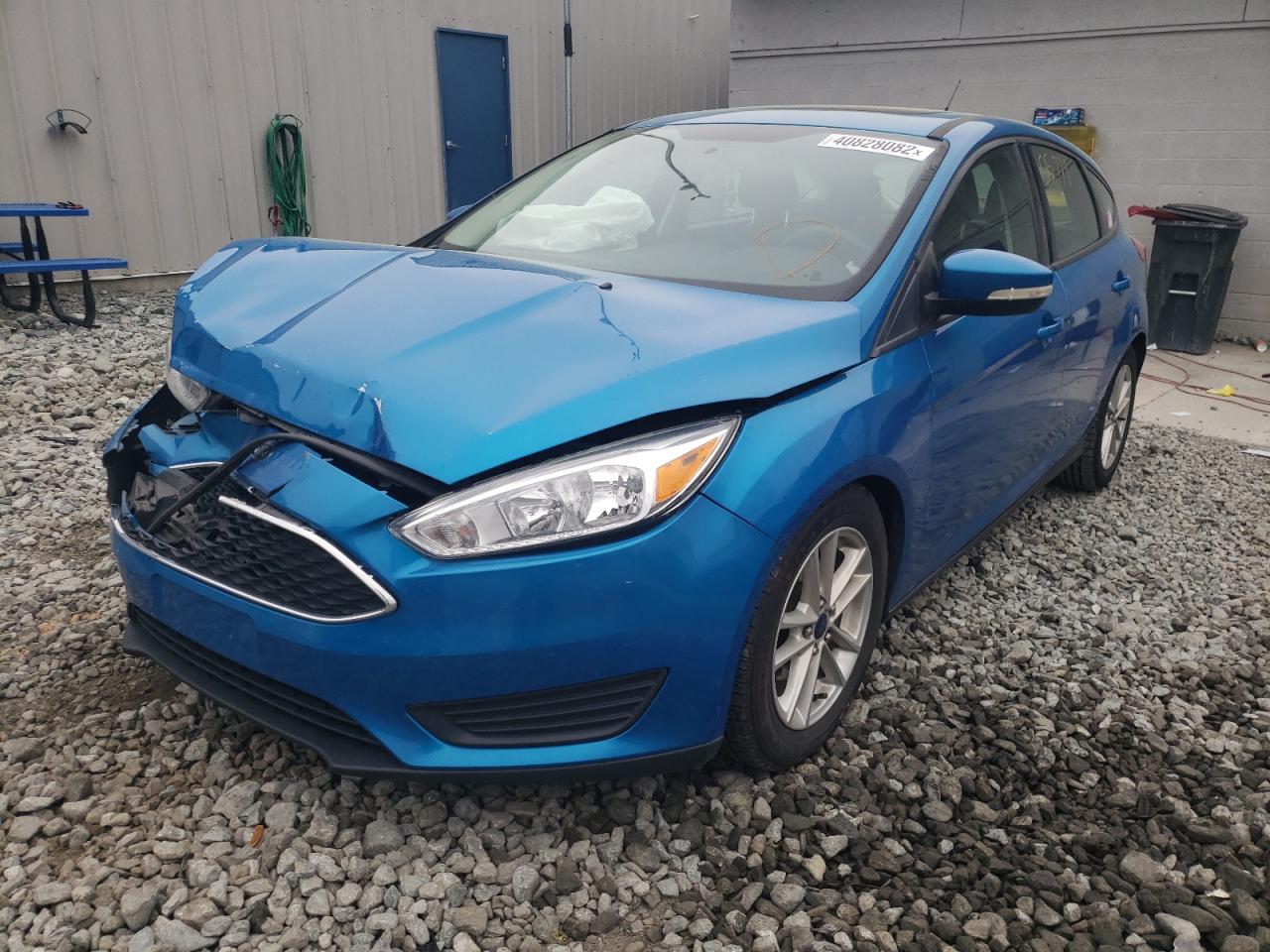 Photo 2 from auction – 2016 FORD FOCUS SE with VIN 1FADP3K21GL284010