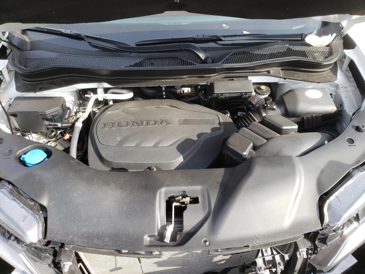 Photo 7 from auction – 2021 HONDA PASSPORT E with VIN 5FNYF8H07MB006874