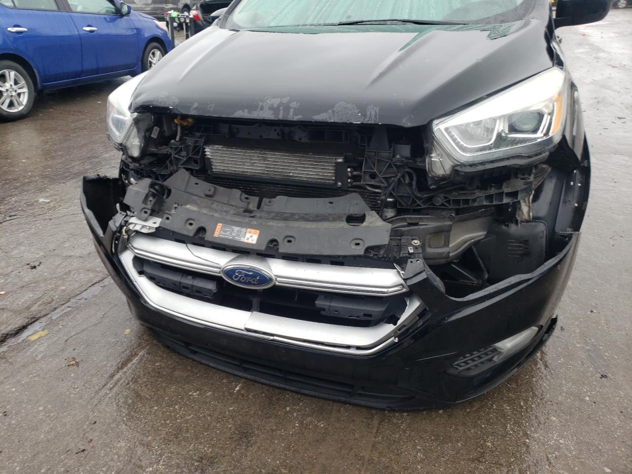 Photo 9 from auction – 2017 FORD ESCAPE SE with VIN 1FMCU0GDXHUA21884