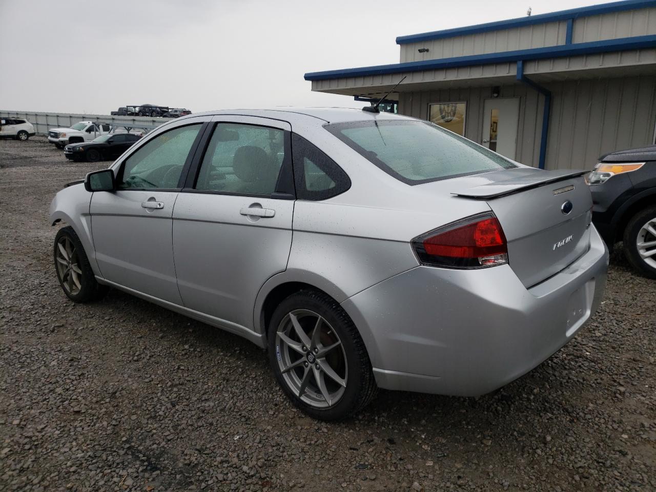 Photo 3 from auction – 2011 FORD FOCUS SES with VIN 1FAHP3GN8BW179640