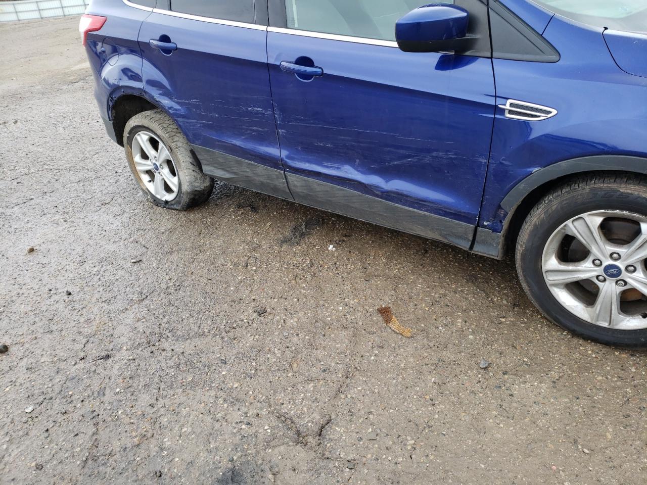 Photo 9 from auction – 2015 FORD ESCAPE SE with VIN 1FMCU0G98FUC16195