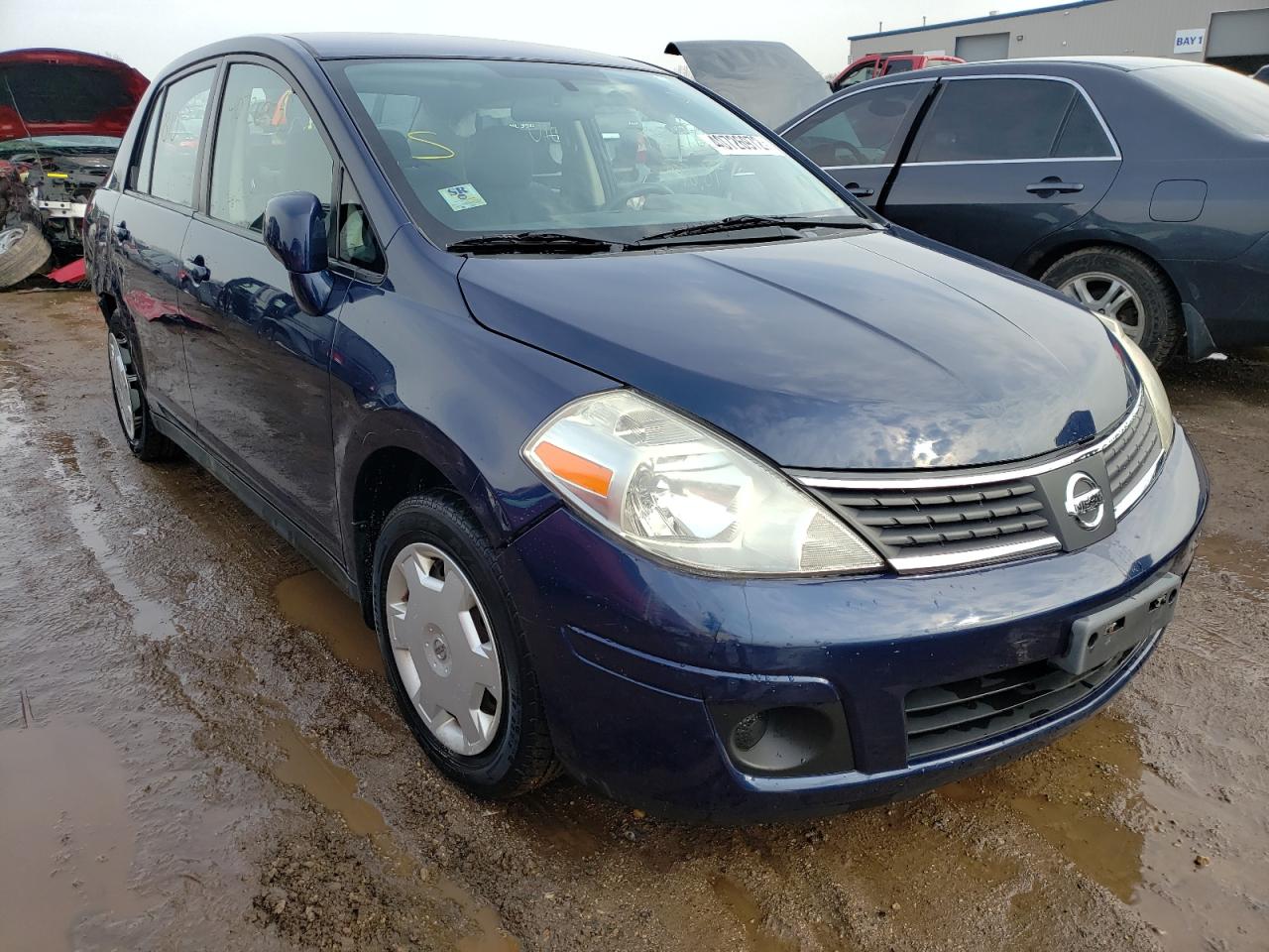 NISSAN VERSA S 2009 with VIN 3N1BC11EX9L466389 - Photo from auction