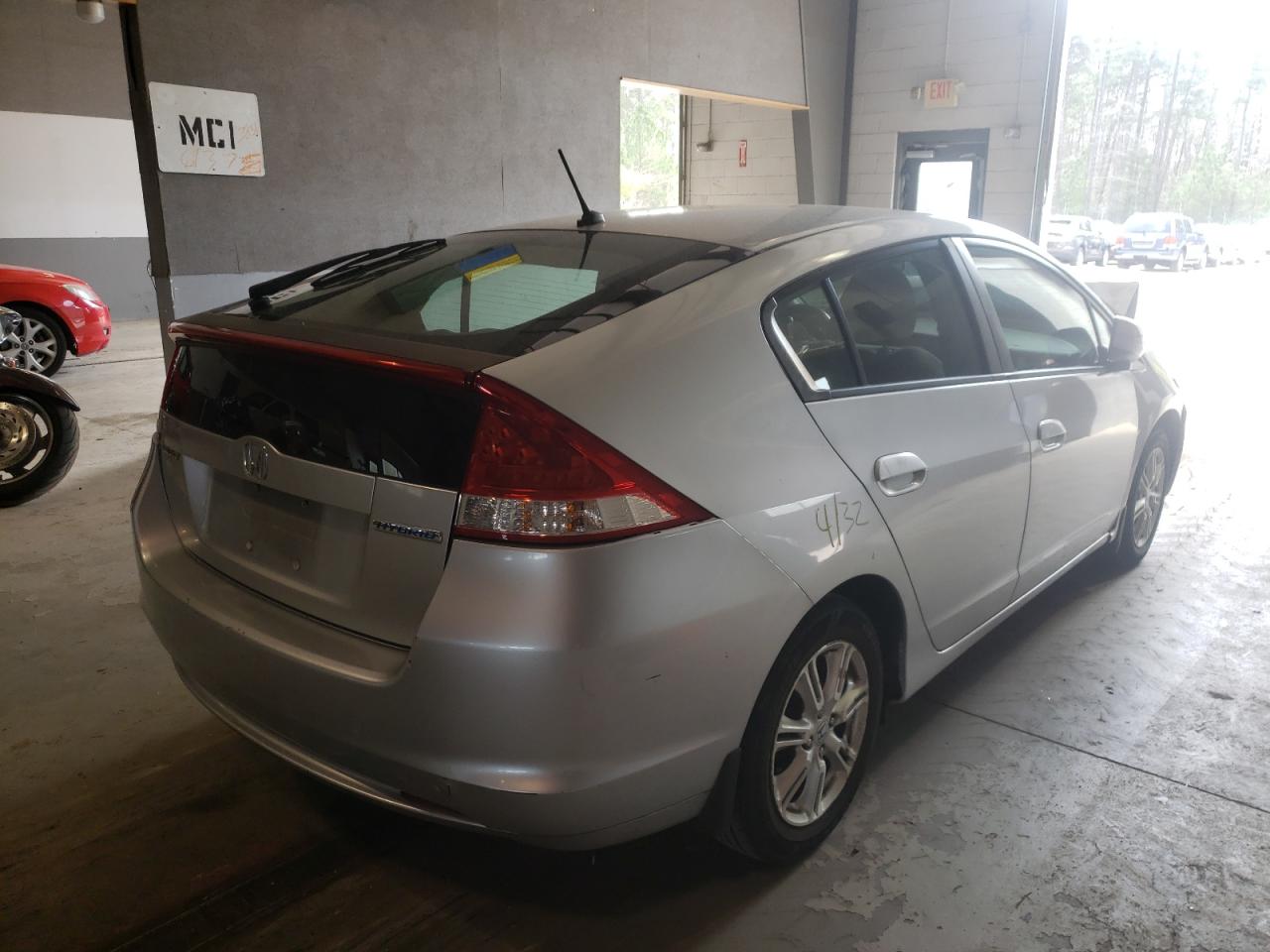 Photo 4 from auction – 2010 HONDA INSIGHT EX with VIN JHMZE2H77AS008221