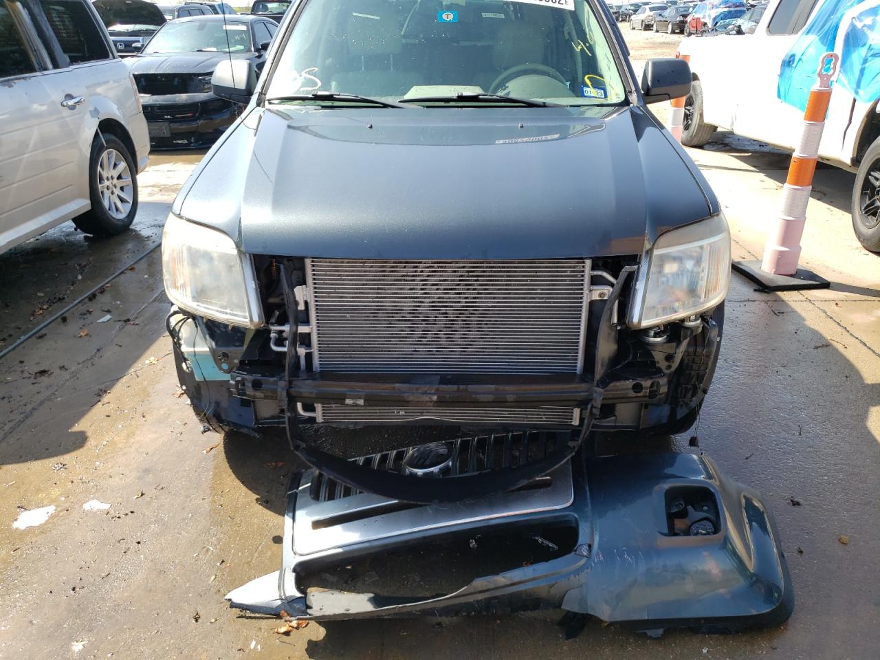 Photo 9 from auction – 2010 MERCURY MARINER with VIN 4M2CN8B78AKJ03058