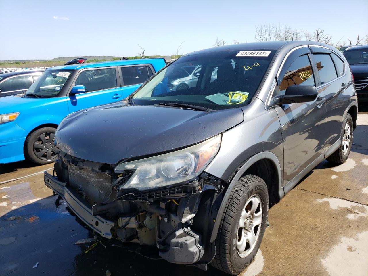 Photo 2 from auction – 2012 HONDA CR-V LX with VIN 2HKRM4H30CH609761