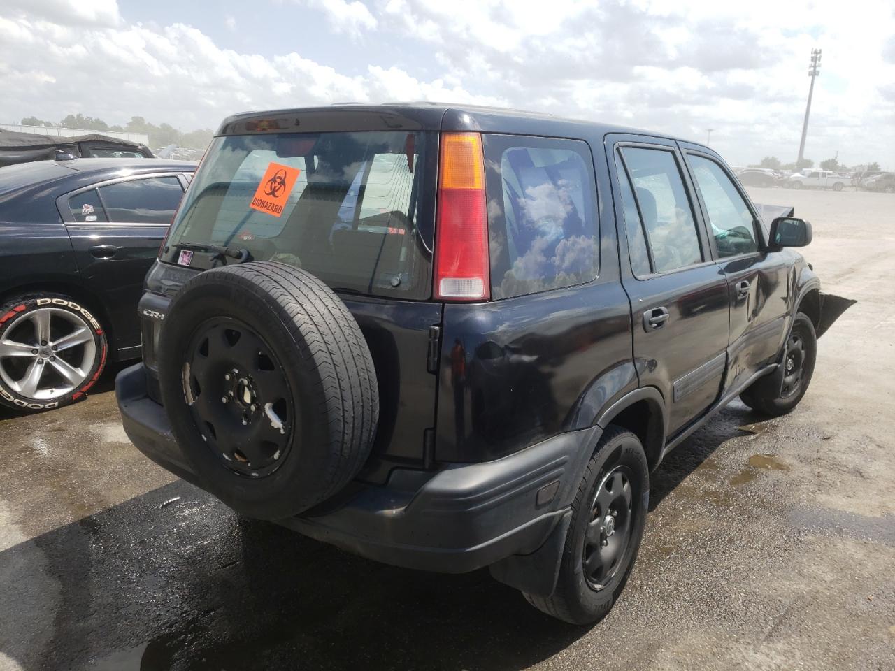 Photo 4 from auction – 2000 HONDA CR-V LX with VIN JHLRD2841YC007549