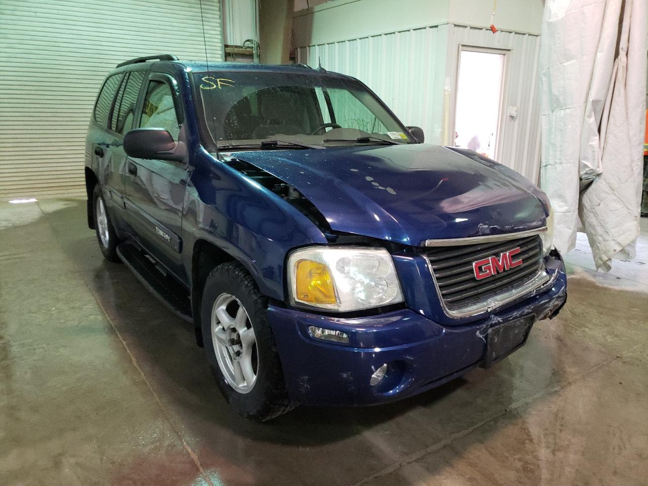 GMC ENVOY 2005 مع رقم تعريف المركبة 1GKDT13S352297034 - صورة من المزاد