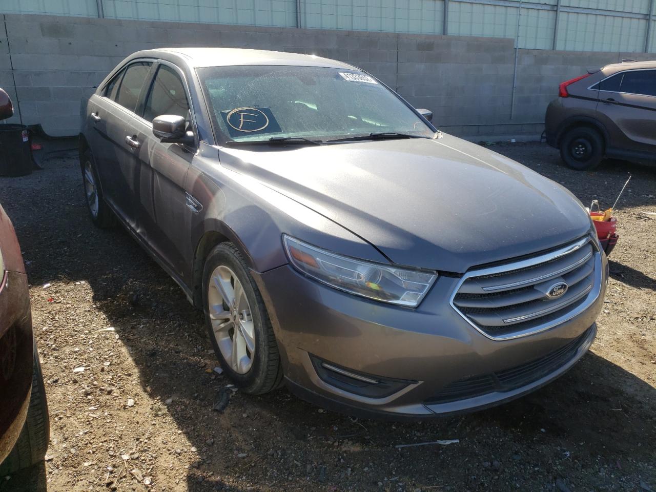 FORD TAURUS SEL 2013 with VIN 1FAHP2E85DG111915 - Photo from auction
